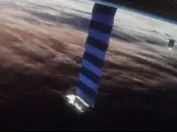 Ilustración de un artista de los satélites de Internet Starlink de SpaceX en órbita.