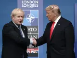 El primer ministro británico, Boris Johnson, junto con el expresidente estadounidense Donald Trump.
