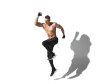 Imagen de la sombra de una persona haciendo deporte.