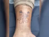 Tatuaje del bofetón de Will Smith a Chris Rock