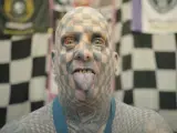 Matt Gone ostenta el récord Guinness a más cuadros tatuados en un cuerpo.