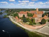 Malbork, Poland - August 14, 2021:Medieval Malbork Castle on the Nogat River, Poland. Historical capital of the Teutonic Order - Crusaders