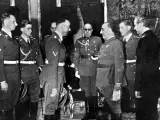 Encuentro entre Heinrich Himmler y Francisco Franco, con José Moscardo (con gafas), al fondo entre ambos.