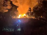 Arde el exterior de una planta de residuos en Colmenar Viejo que a su vez origina un incendio de vegetación