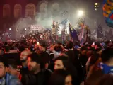 Aficionados del Nápoles celebrando la victoria en el "Scudetto".