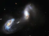 Galaxias en interacción AM 1214-255.