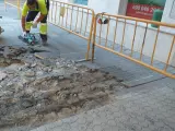 Reparación acerado de una calle de Sevilla
