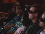 Varias personas en el cine.