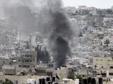 Sale humo de los edificios después de que las fuerzas israelíes llevaran a cabo ataques aéreos e incursiones en la ciudad de Yenín, Cisjordania, el 3 de julio de 2023.