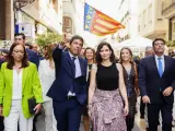 Isabel Díaz Ayuso y Carlos Mazón, en el centro de la imagen, este lunes en Valencia.