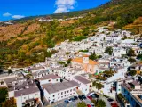 Pampaneira village aerial panoramic view. Pampaneira is a village in the Alpujarras area in the province of Granada in Andalusia, Spain.