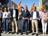 Rajoy, Feijóo y Aznar, este domingo en Madrid.
