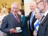TETBURY, ENGLAND - NOVEMBER 13: King Charles III's shares a joke with guests as he attends his 75th birthday party hosted by the Prince's Foundation at Highgrove House on November 13, 2023 in Tetbury, England. Guests include local residents who have been nominated by friends and family and individuals and organisations also turning 75 in 2023. (Photo by Chris Jackson/Getty Images)