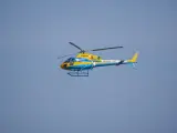 Imagen de archivo de un helicóptero de la DGT vigilando las carreteras.
