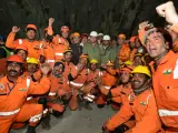 This handout photo provided by the Uttarakhand State Department of Information and Public Relations shows rescue workers cheer, along with Pushkar Singh Dhami, Chief Minister of Uttarakhand state, center wearing white helmet, and Indian Minister of State of Road Transport and Highways V.K. Singh, center right, in the northern Indian state of Uttarakhand, India, Tuesday, Nov. 28, 2023. All 41 construction workers who were trapped in a collapsed mountain tunnel for more than two weeks were pulled out on Tuesday, bringing a happy end to a drawn-out rescue mission. (Uttarakhand State Department of Information and Public Relations via AP)
