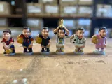 Seis de las versiones de Leo Messi como caganer.