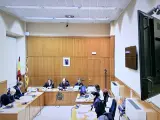 Una sesión del juicio a los tres acusados de asaltar con una pistola una casa de Badalona para cobrarse una deuda.