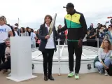 Anne Hidalgo, junto a Usain Bolt en un acto promocional de los JJOO de París.