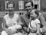 Picture taken in 1969 shows then Princess Margrethe of Denmark and Prince Henrik presenting their little newborn Prince Joachim while older brother Crown Prince Frederik looks on, at Fredenborg Castle, Denmark. Danes were on January 1, 2024 slowly coming to terms with Queen Margrethe's surprise announcement that she will abdicate on January 14, 2024 in favour of her son after 52 years on the throne. (Photo by Allan Moe / Ritzau Scanpix / AFP) / Denmark OUT