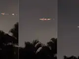 Momento en el que se incendia uno de los motores de un avión de carga Boeing 747, que tiene que aterrizar de emergencia en Miami.