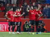 Los jugadores del Mallorca celebran uno de los goles ante el Girona.