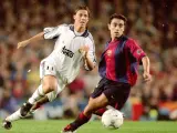 Guti y Xavi, durante su etapa de jugadores en Real Madrid y FC Barcelona.