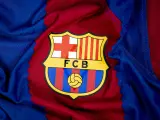 Escudo y camiseta del Barça.