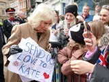 SHREWSBURY, ENGLAND - MARCH 27: Queen Camilla receives a message of support for Catherine, Princess of Wales from well-wishers during her visit to the Farmers' Market on March 27, 2024 in Shrewsbury, England. (Photo by Chris Jackson - Pool/Getty Images)