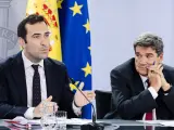 El ministro de Economía, Carlos Cuerpo (i) y el ministro para la Transformación Digital, José Luis Escrivá (d).