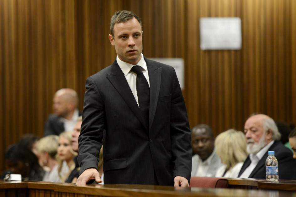 South African Paralympic athlete Oscar Pistorius enters the courtroom of the High Court in Pretoria, South Africa.