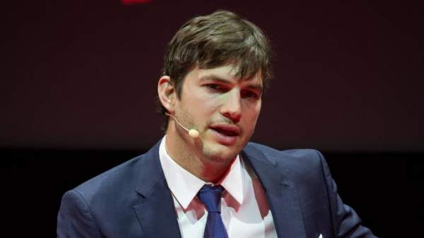 Ashton Kutcher speaks at a Netflix event in Paris about his new series, 'The Ranch', of which he is also a producer.
