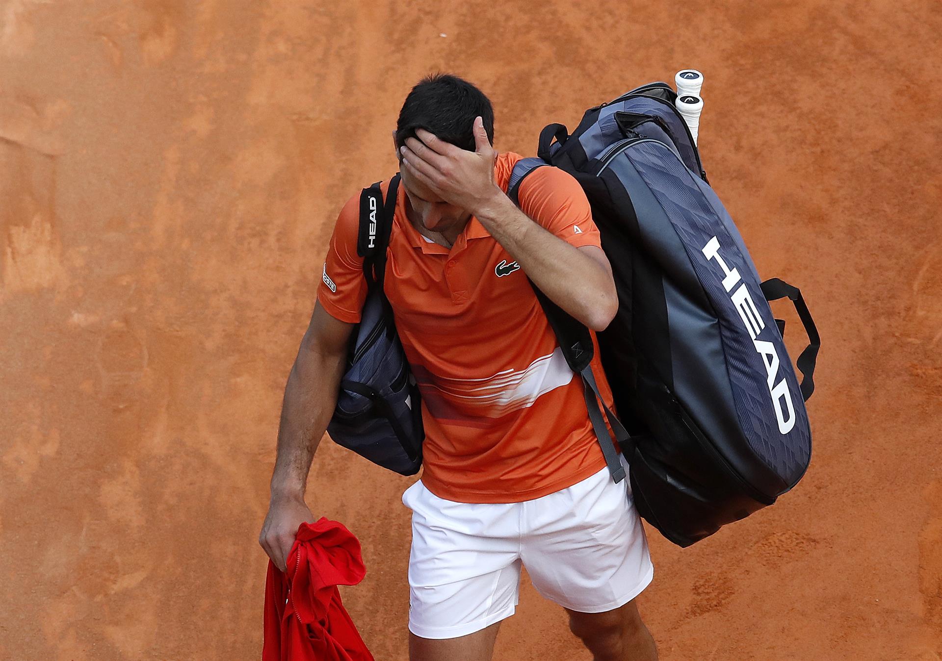Djokovic laments after his loss to Davidovich.