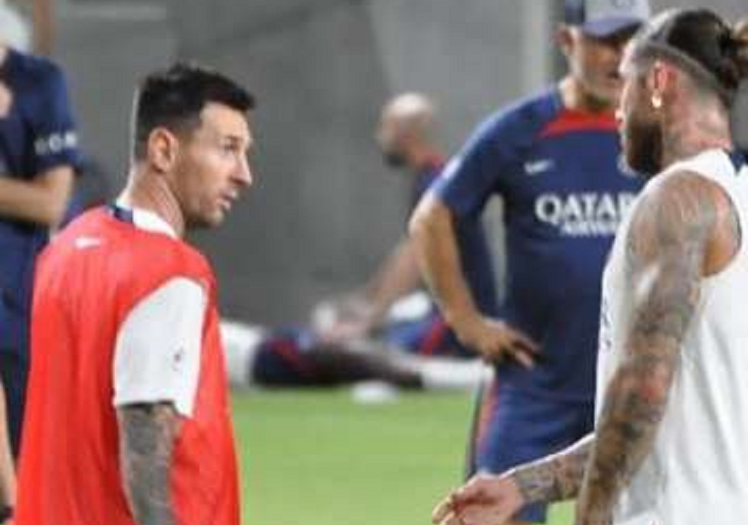 Messi and Sergio Ramos exchange glances after a hard tackle from the central defender.