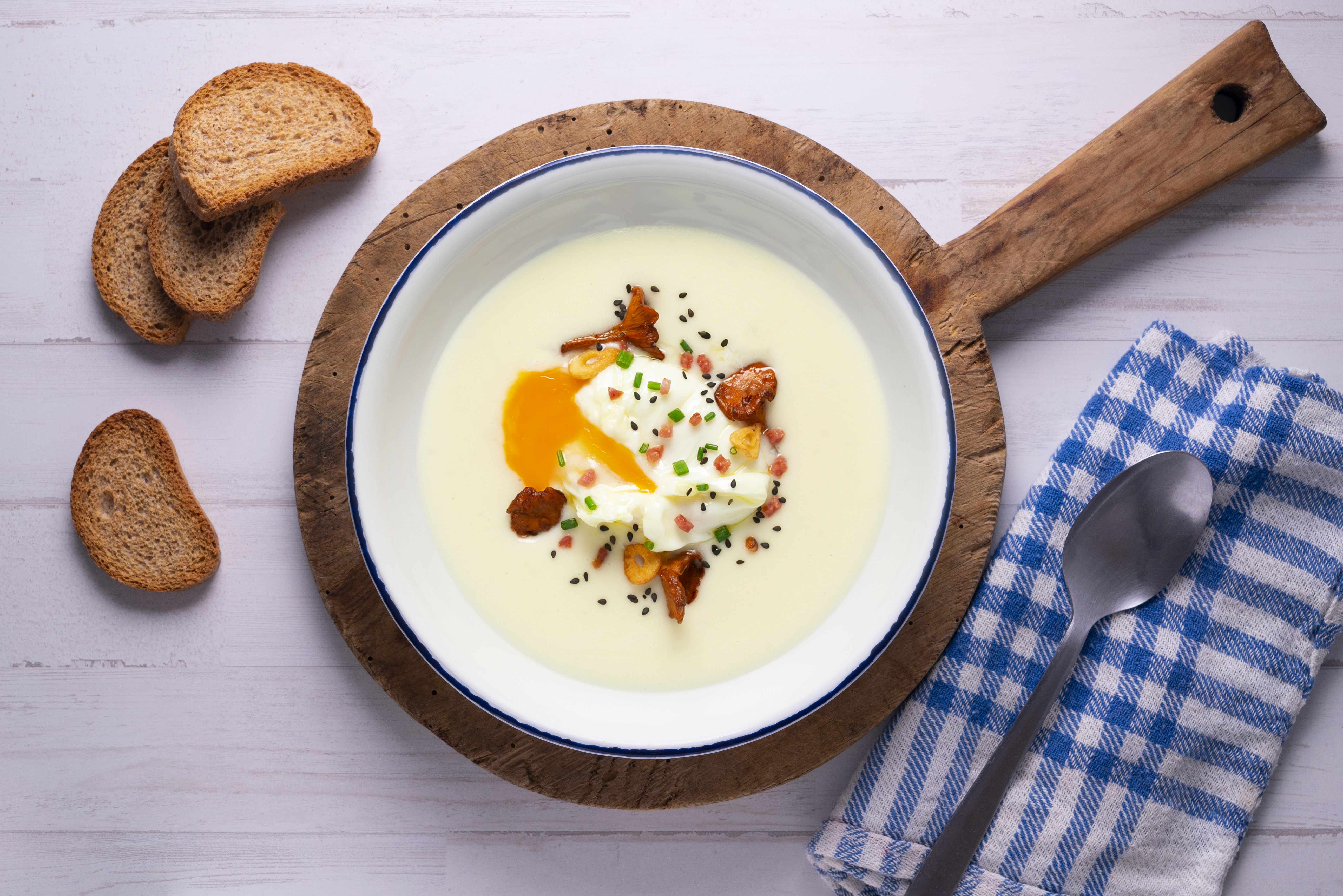 Cream of potatoes with poached egg and mushrooms