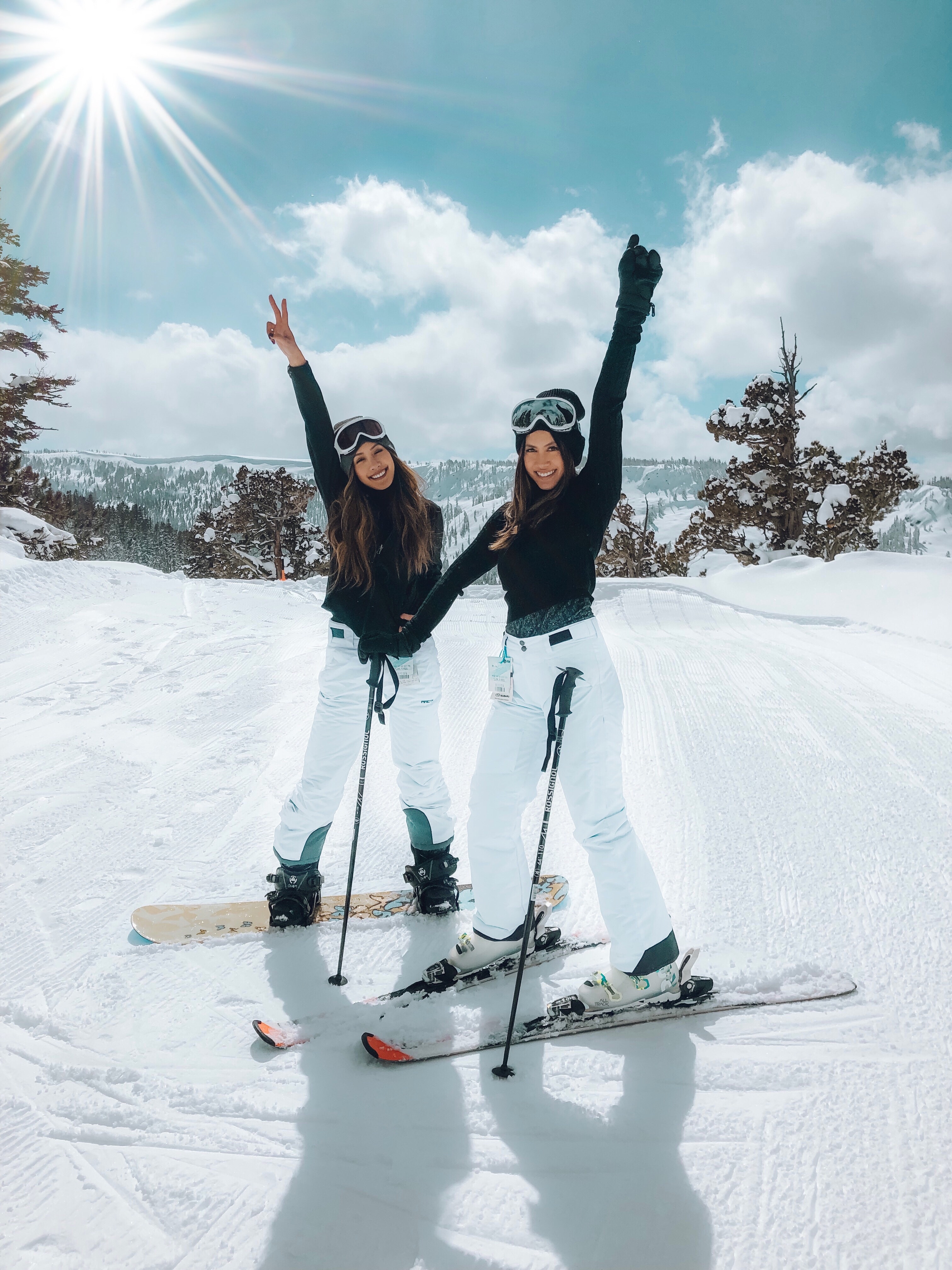 Female friends enjoying a sunny ski day