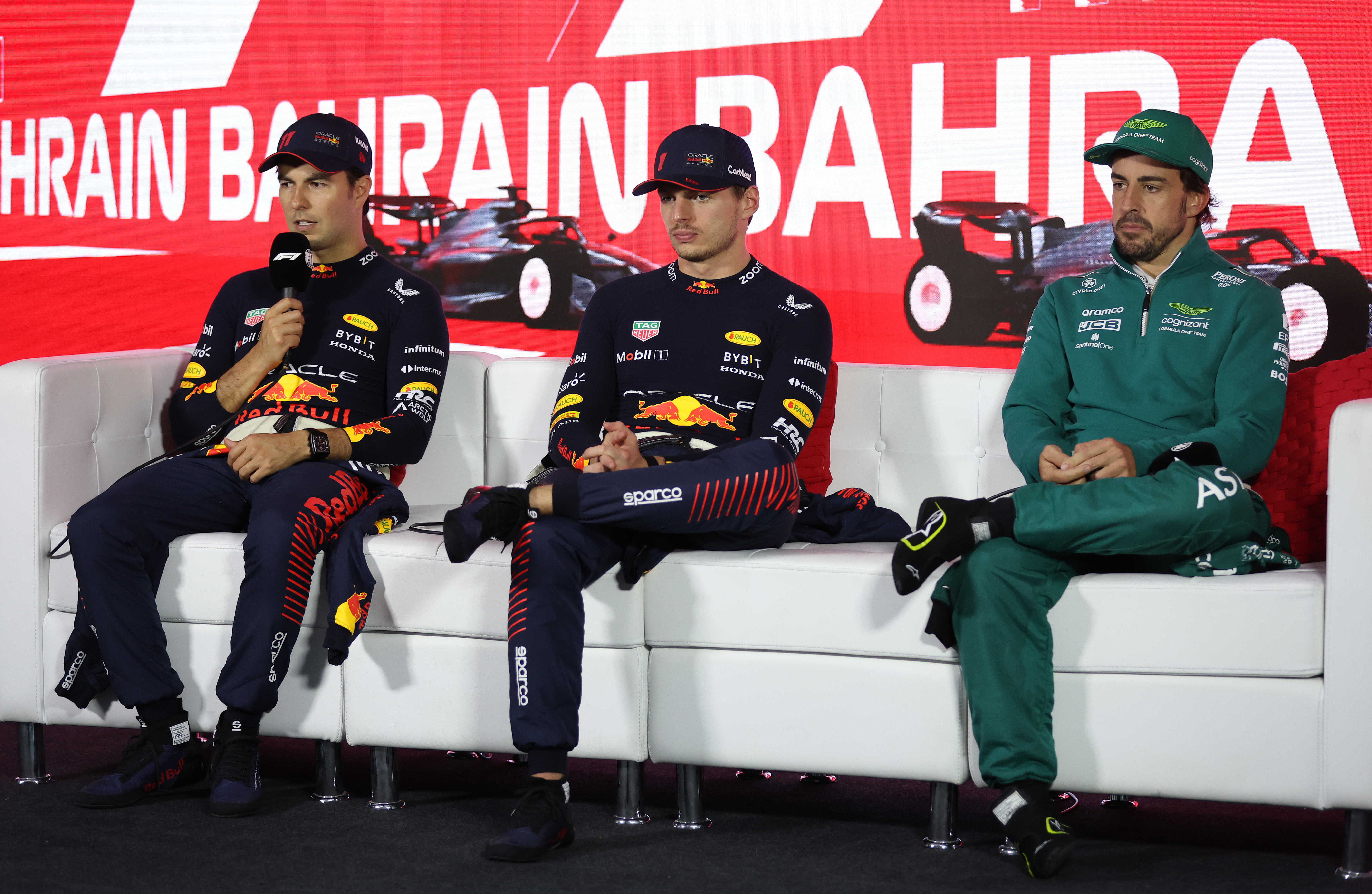 Checo Pérez, Max Verstappen and Fernando Alonso at the press conference after the Bahrain GP.