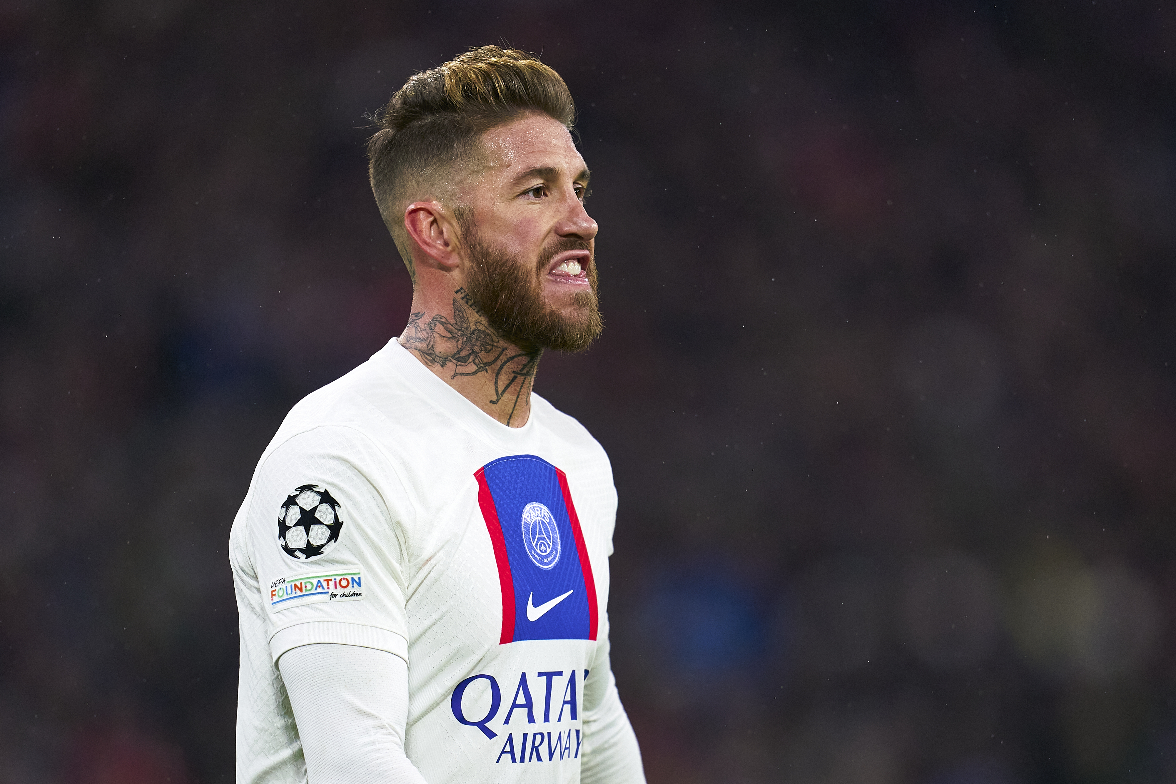Sergio Ramos whistles to a teammate during the Bayern-PSG match.
